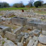 archeology site with tombs and walls